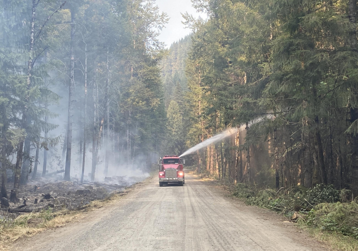 spraying water on the 15 road