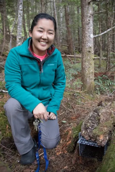 OSU PhD student, Marie Tosa, with small mammal trap