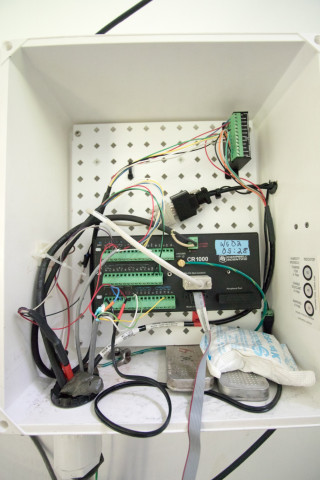 Instrumentation in Watershed 2: Campbell Scientific CR-1000 data logger collects data on stream stage (water depth) in the flume, air and water temperature, and water conductivity. It triggers the automated Hach/Sigma water sampler based on stage height.