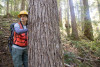 REU students April Hersey (L) and Aaron Evans (R) identify trees to be cored for a study on vegetation dynamics. The cores will allow researchers to learn more about trends in radial growth and climate-growth relationships over time.